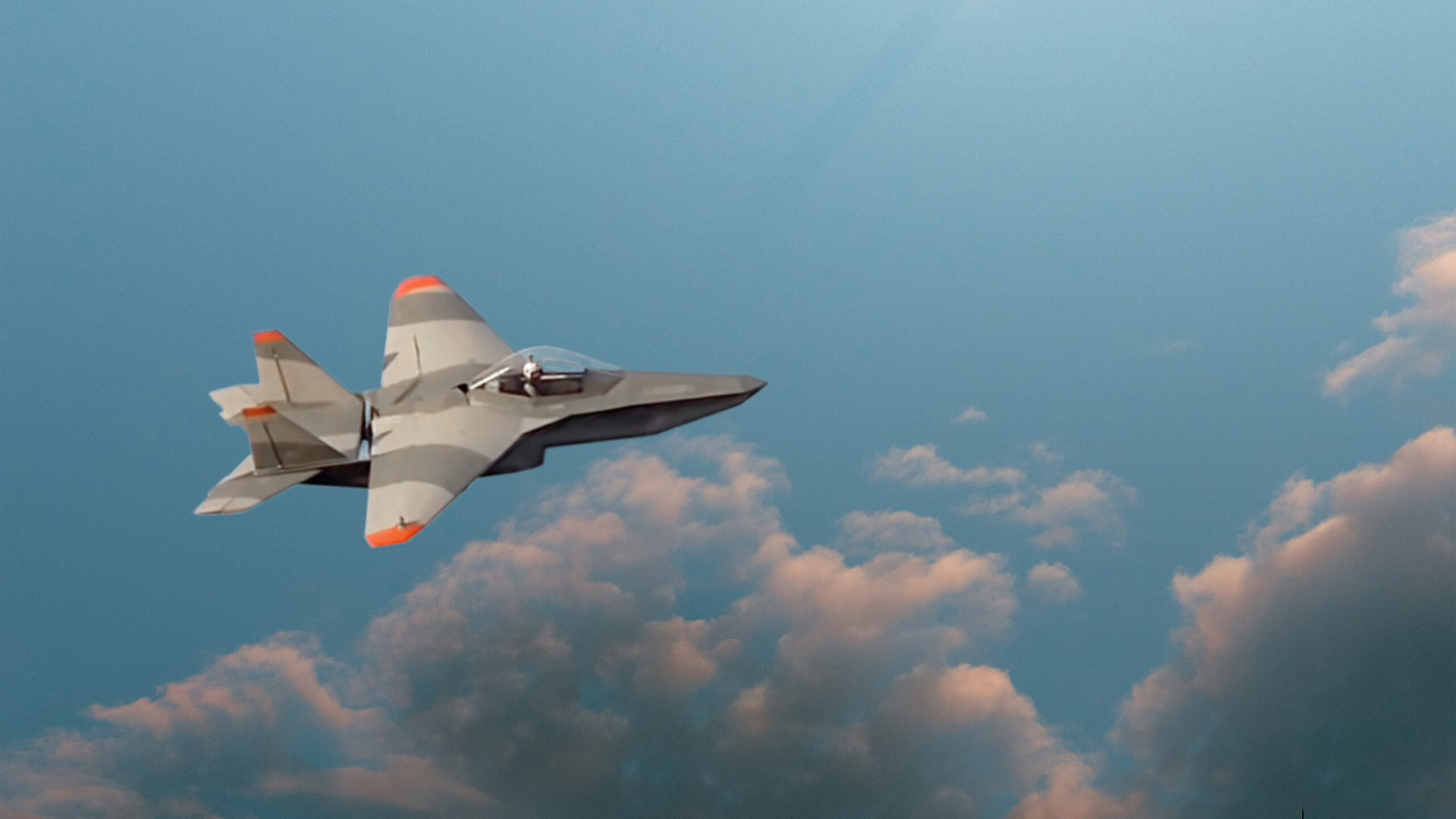 Photo looking down of an SF-1 Archon flying over cultivated fields.